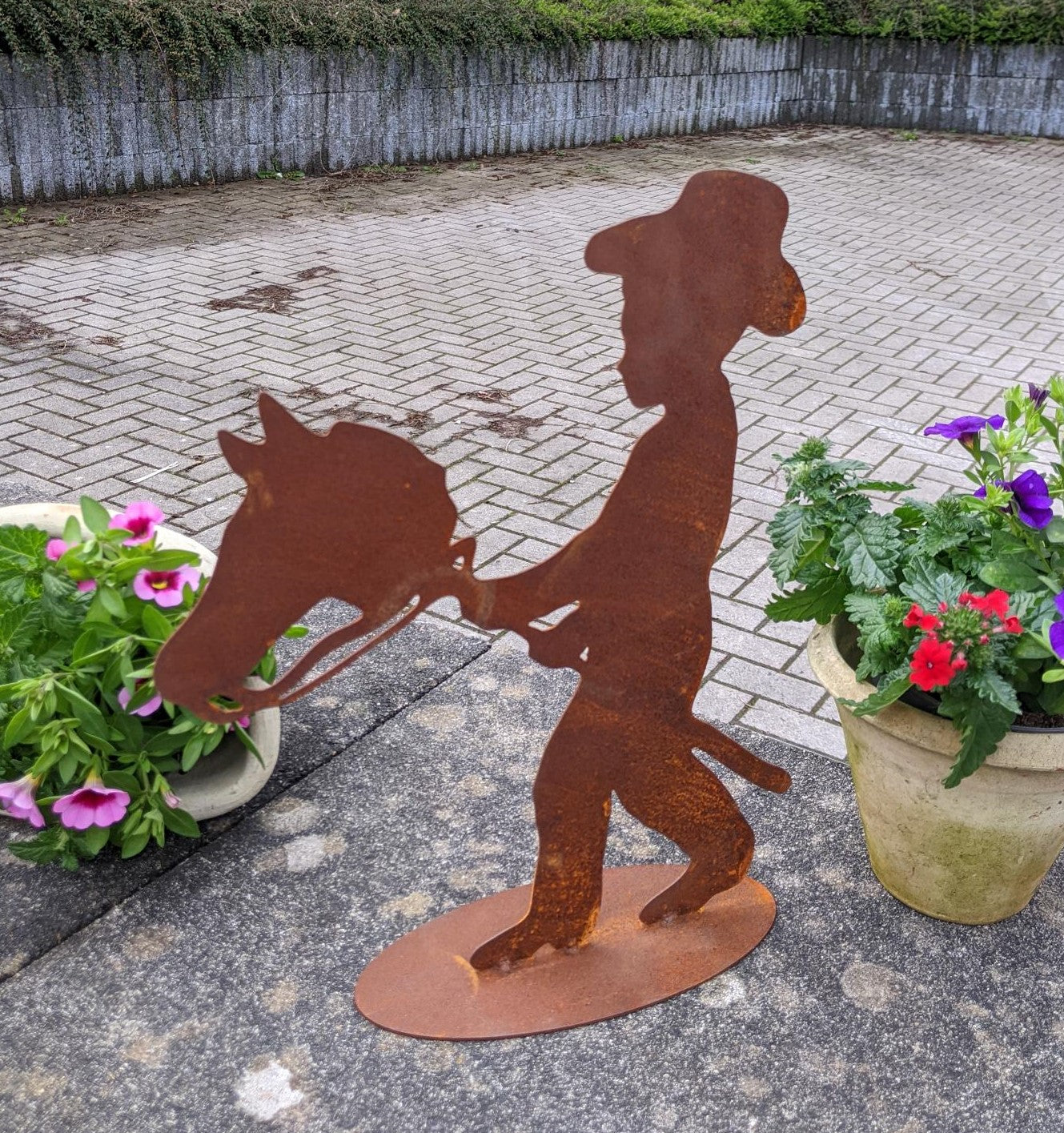 NEU !! Junge mit Steckenpferd ca. 34 cm hoch aus Metall in Edelrost Dekoration